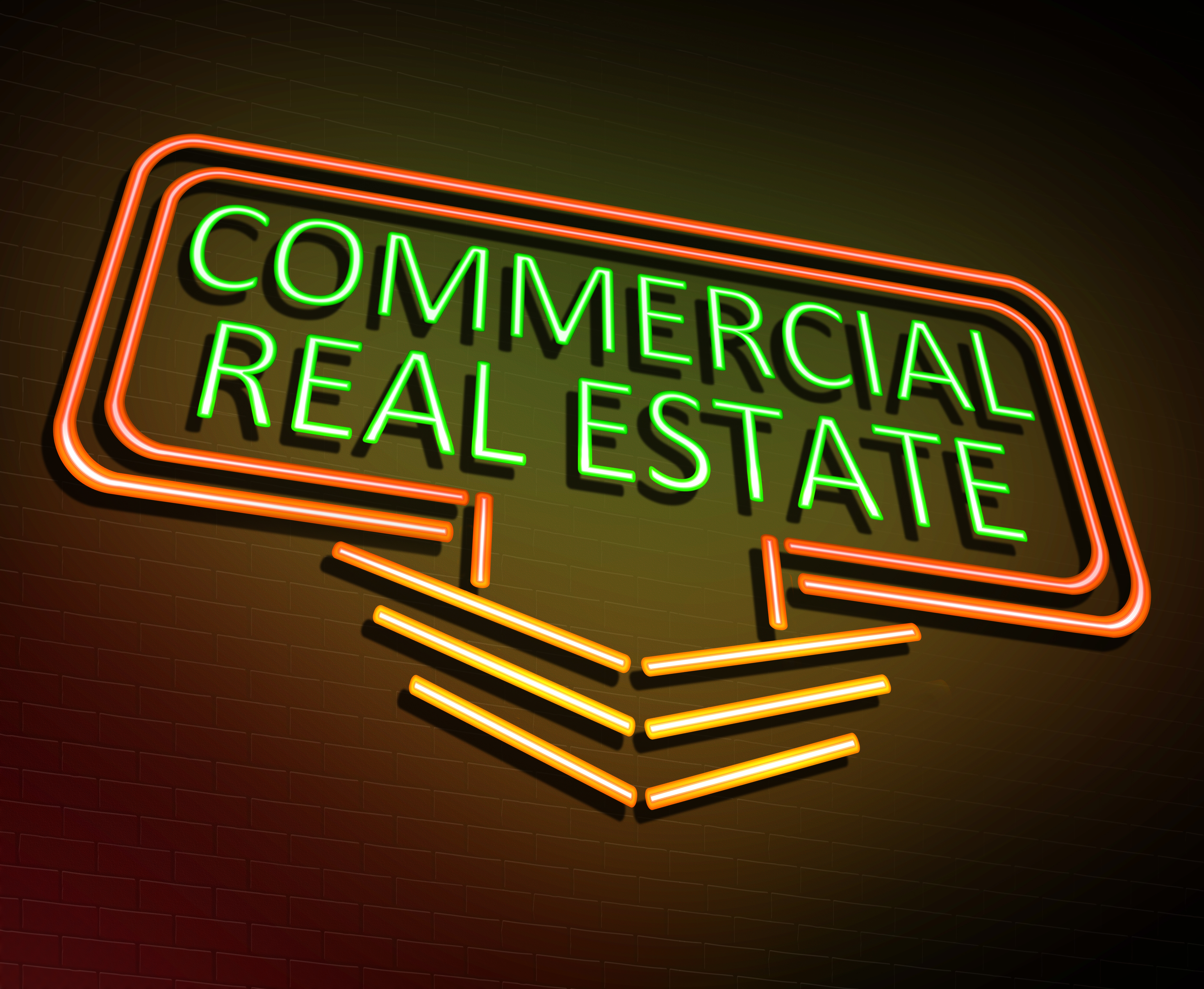 Commercial real estate neon sign that is pointing downward